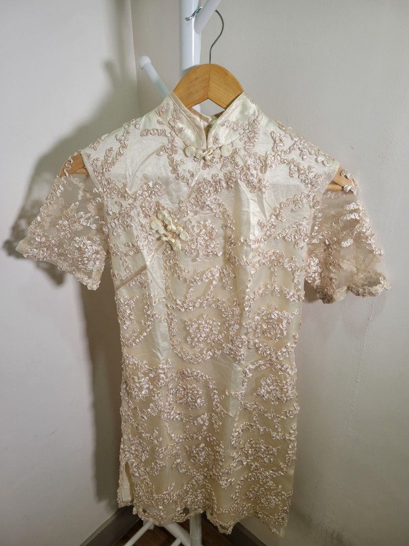 Off White Qipao-Inspired Silky Dress (Category: Dresses) located in Las Pinas. Submitted by cabinetchasu (Listing ID 1375207859, Image 1). Description: Please read before messaging 🔻⬇️🔽👇 Details: - No brand - Fits XS to S body frame - Hand me down Qipao-inspired off white silky dress, tita ko po ang first owner - Barely worn and only used for an event - Has one minor flaw but barely noticeable, check last pic - Dress is in good condition, zipp