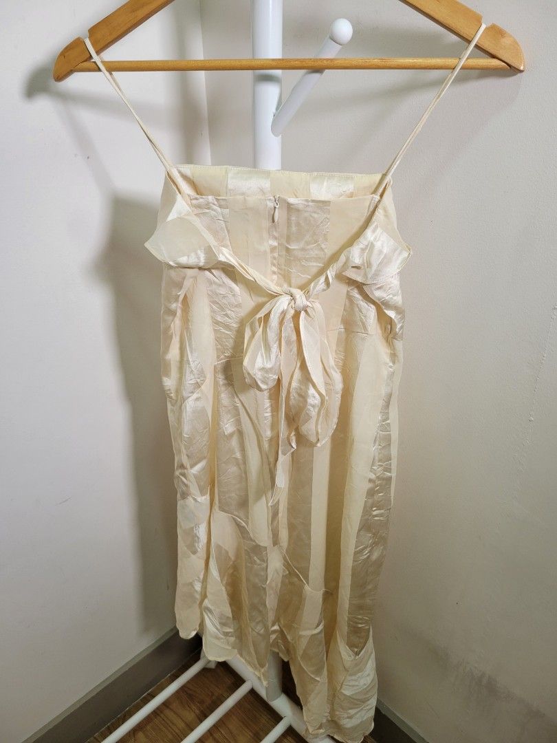 Off White Thin Shoulder Strap Dress (Category: Dresses) located in Las Pinas. Submitted by cabinetchasu (Listing ID 1375216113, Image 2). Description: Please read before messaging 🔻⬇️🔽👇 Details: - Off brand, hand me down dress - Fits XS to S body frame - In good quality condition with no flaws - RFS doesn't fit me and decluttering - Can offer last price to sure buyers only, just ask kindly MOP Gcash, BPI, or BDO Shipping fee care of buyer Can 