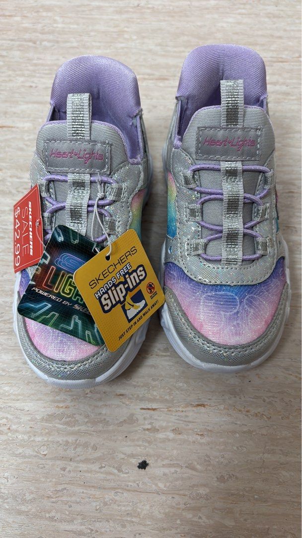 Skechers Shoes (Category: Babies & Kids Fashion) located in Singapore. Submitted by tapo_man (Listing ID 1375140073, Image 1). Description: Brand new original Skechers hands free slip ins, heart lights .