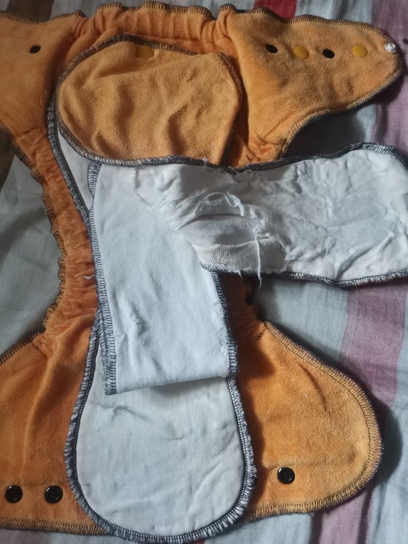 2pcs Preloved HF Cloth Diaper (Category: Diapers & Baby Wipes) located in Quezon City. Submitted by c_and_a_haus (Listing ID 1375325701, Image 2). Description: Cover type and pocket type. Poopeetrap and Rock Baby brands. Para sa hindi maselan at madiskarte. Relaxed garters and heavily used pero magagamit pa. Puede din iparepair ung garter sa mga marunong magrepair..