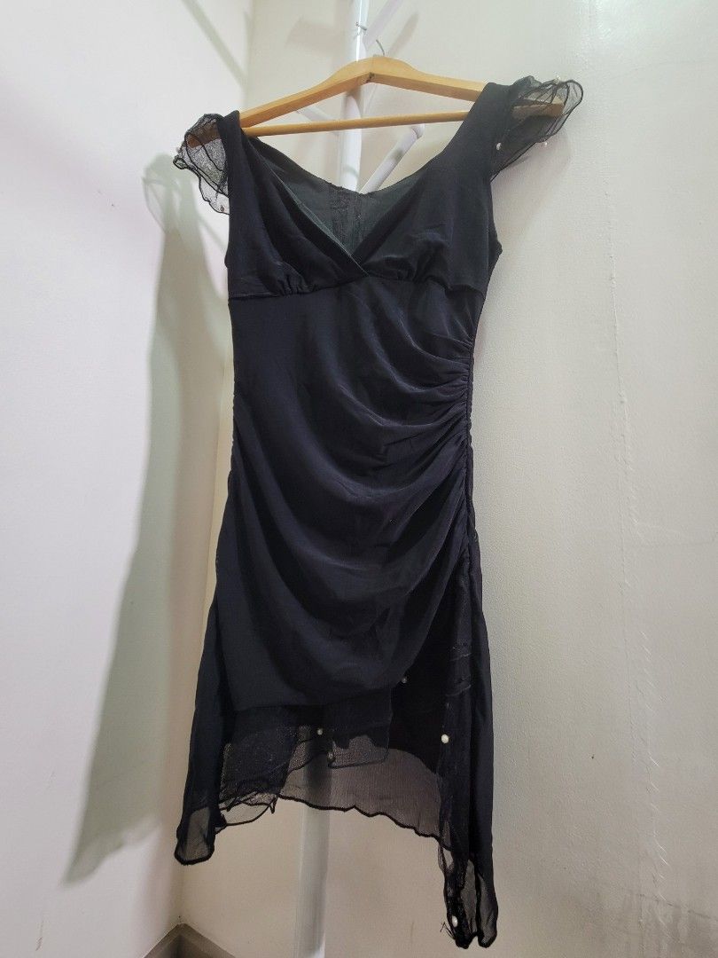 Black Asymmetrical Dress with Pearls (Category: Dresses) located in Las Pinas. Submitted by cabinetchasu (Listing ID 1375387922, Image 1). Description: Please read before messaging 🔻⬇️🔽👇 Details: - Offbrand but Taytay tiangge quality - Fitted type, hand me down dress but in okay quality - May part na manipis lang sa likod but overall everything is intact naman - Fits XS to S body frame - RFS decluttering - Can offer last price to sure buyers o