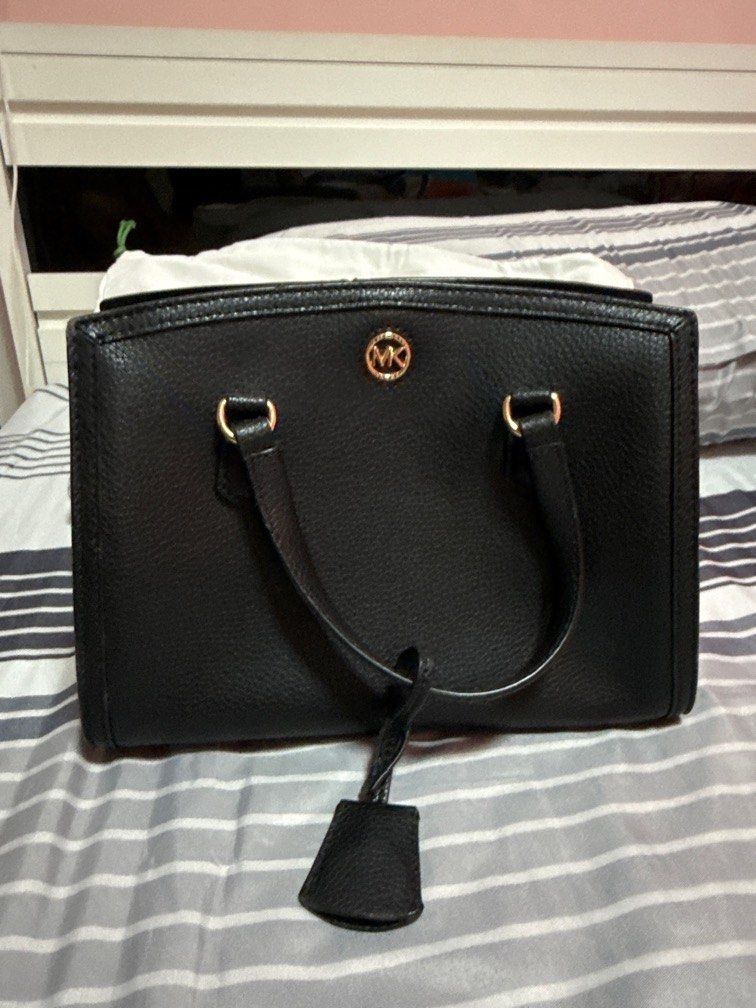 Black Michael Kors (MK) Bag with sling (Category: Bags & Wallets) located in Singapore. Submitted by eatmysorrows (Listing ID 1375349740, Image 1). Description: not used at all, just stored in dustbag. bought as a present but i dont use it hence, selling away to someone who will appreciate it more. still got original box. negotiable but pls dont lowball. meet ups at our convi! .