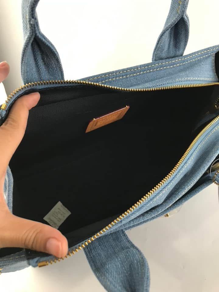 Coach denim tote (Category: Tote Bags) located in Manila. Submitted by gff.daily_flower (Listing ID 1375284886, Image 3). Description: With tag gift receipt dust bag and paperbag.