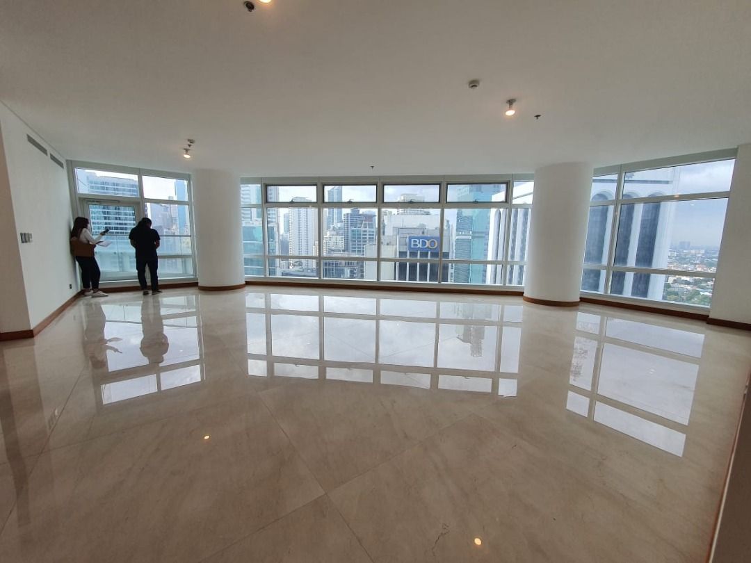 FOR SALE: TWO ROXAS TRIANGLE 3BR (Category: Apartments & Condos) located in Quezon City. Submitted by david_santos (Listing ID 1375384652, Image 1). Description: FOR SALE: TWO ROXAS TRIANGLE 3BR - 308 sqm - 3 bedrooms, + 1 maid's quarter - 4 bathrooms, + 1 maid's t&b - 2 parking slots, included to unit selling price FOR LEASE: Php 375k/month (semi-furnished) Php 475k/month (fully furnished) FOR SALE: PhP 184,800,000 or 600k/sqm plus VAT Contact u