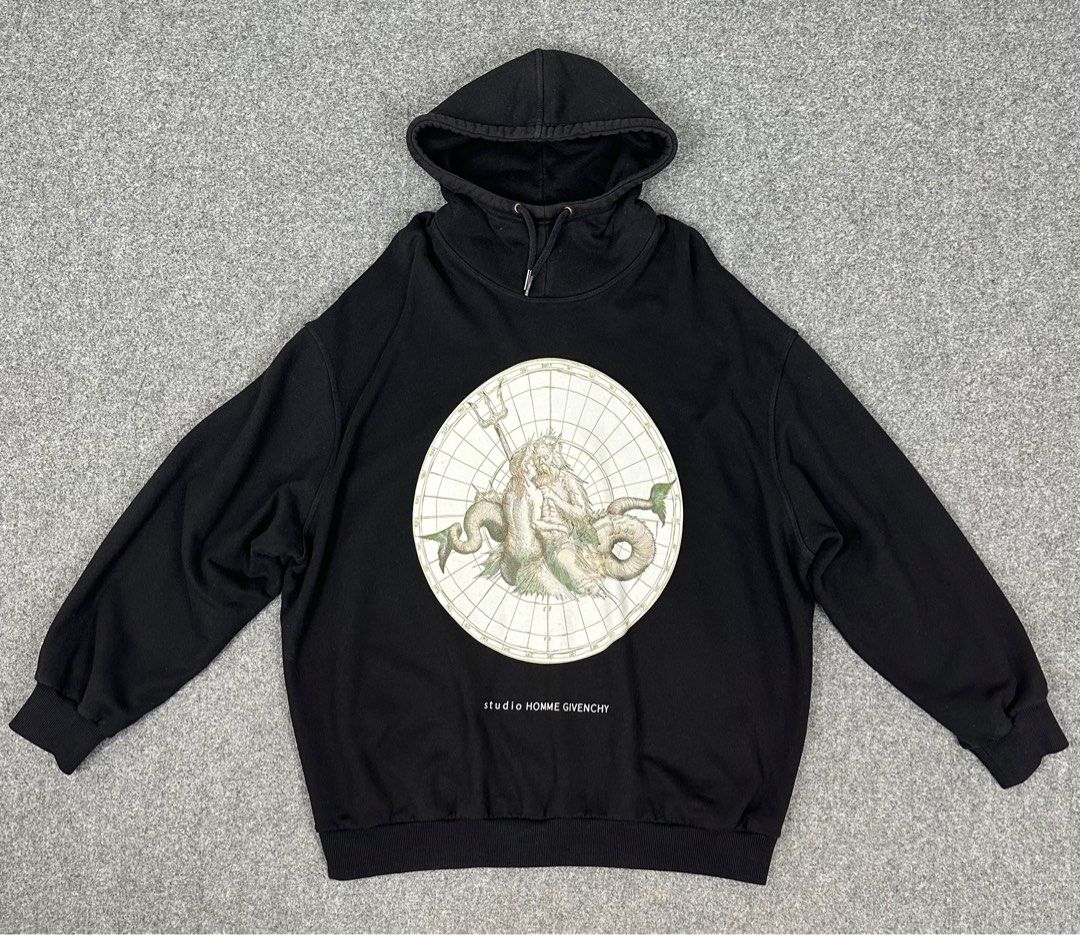 Givenchy - Studio Homme - Oversized Atlantis Hoodie Jacket - Black (Category: Coats, Jackets and Outerwear) located in Manila. Submitted by scissor.2fifthy (Listing ID 1375302541, Image 1). Description: Givenchy - Studio Homme - Oversized Atlantis Hoodie Jacket - Black. Tagged size: Medium / Oversized fit XL (see measurement) Made in Portugal Material: 100% Cotton Product number: BMJ07S305B 90/100 condition rate Good condition Flaw: Minor sign of