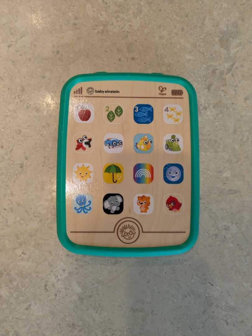 Hape Baby Einstein Language tablet toy (Category: Infant Playtime) located in Singapore. Submitted by yotamfogelman (Listing ID 1375349206, Image 1). Description: Hape Baby Einstein Magic Touch Curiousity Tablet. Lightly used..