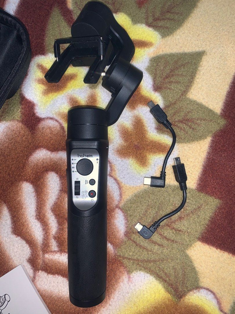 Hohem isteady pro (Category: Gimbals & Stabilizers ) located in Manila. Submitted by khlenggg (Listing ID 1375415509, Image 1). Description: RFS: need funds Issue: walang stand pero all goods pa din.