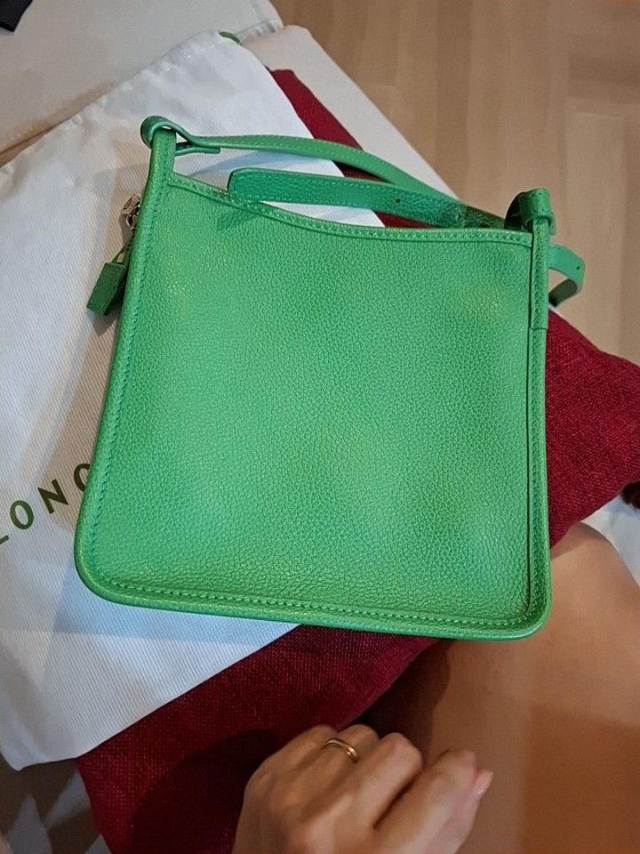 Longchamp Green Leather Bag (Category: Bags & Wallets) located in Singapore. Submitted by esther12 (Listing ID 1375402289, Image 1). Description: This is a Longchamp leather crossbody bag. just bought in Taipei. 2 compartments inside. brand new..
