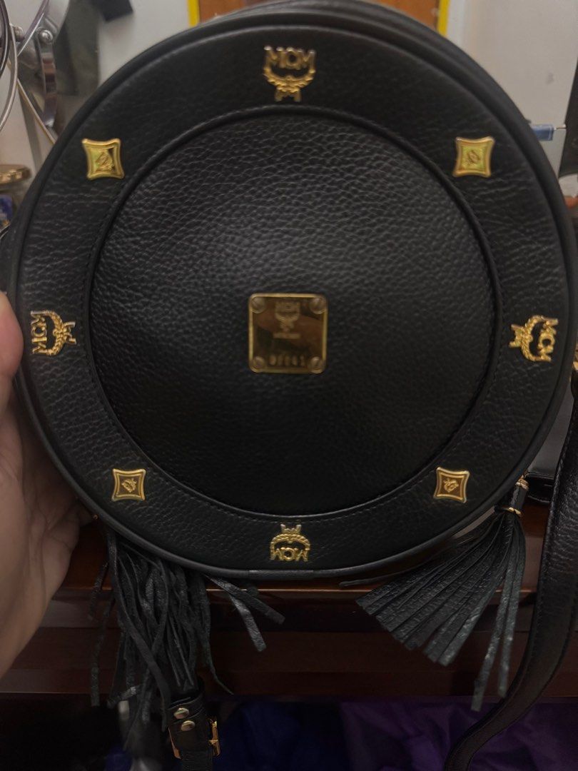 MCM crossbody bag (Category: Luxury Bags & Wallets) located in Koronadal. Submitted by milagraciaukayukay123_. (Listing ID 1375287039, Image 3). Description: Minimal sign of used on hardware. No issue on leather. Vibrant color. All hardwares are gold. .