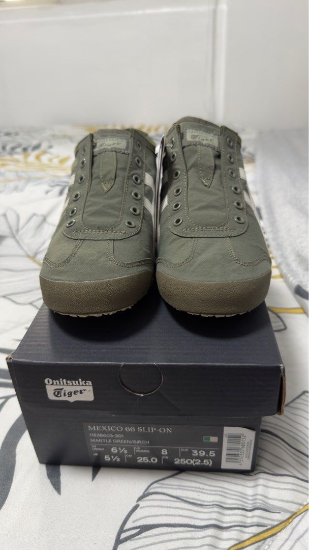 Onitsuka mexico 66 slip on (Category: Sneakers) located in Taguig. Submitted by khellie20 (Listing ID 1375445069, Image 1). Description: Mexico 66 Slip On Size: US Women 8, euro 39.5 Color: Mantle green/ birch Bought this at Onitsuka Japan RFS: too snug fit Selling this for ₱6800 fixed.