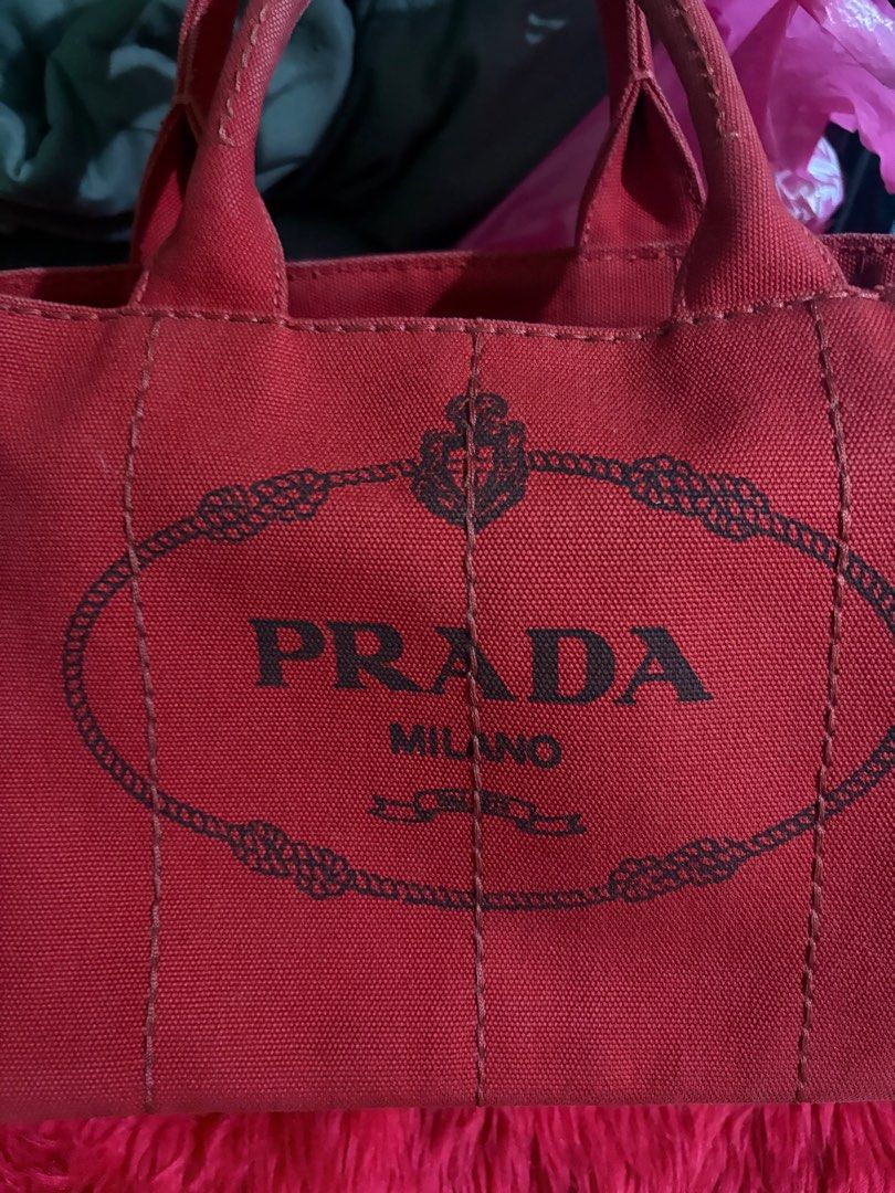 Prada Red Canapa Small (Category: Luxury Bags & Wallets) located in Quezon City. Submitted by randomstuffdeclutter33 (Listing ID 1375313381, Image 1). Description: Bag Only. Good as new..