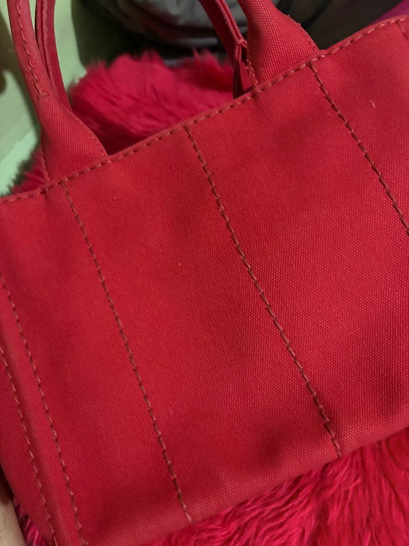 Prada Red Canapa Small (Category: Luxury Bags & Wallets) located in Quezon City. Submitted by randomstuffdeclutter33 (Listing ID 1375313381, Image 2). Description: Bag Only. Good as new..
