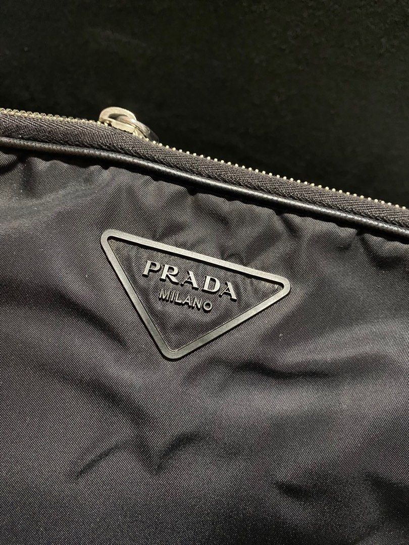 Prada sling bag (Category: Luxury Bags & Wallets) located in Baguio. Submitted by fullroom.dgs (Listing ID 1375347341, Image 2). Description: Prada sling bag very good condition authentic hard to zipper please check photos.