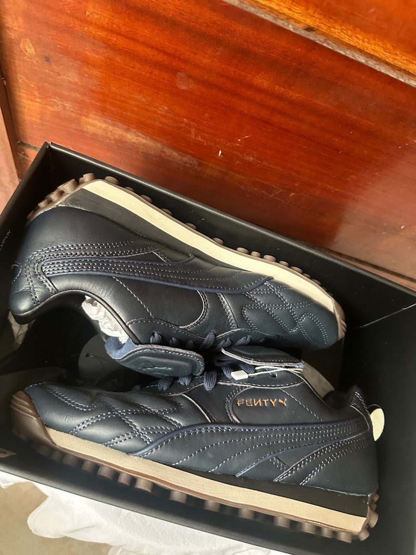 Puma x Fenty Avanti L (Category: Sneakers) located in Makati City. Submitted by ann_savvy (Listing ID 1375338149, Image 1). Description: Brand new complete with Velvet dust bag, box and extra shoe lace Puma x Fenty in Club Navy (Navy blue) I’m a 6.5-7 and this fits me well. Not yet worn, brand new condition. Price is negotiable but no lowballing please. 😊.