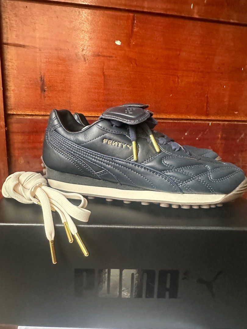 Puma x Fenty Avanti L (Category: Sneakers) located in Makati City. Submitted by ann_savvy (Listing ID 1375338149, Image 3). Description: Brand new complete with Velvet dust bag, box and extra shoe lace Puma x Fenty in Club Navy (Navy blue) I’m a 6.5-7 and this fits me well. Not yet worn, brand new condition. Price is negotiable but no lowballing please. 😊.