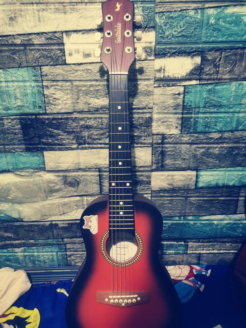 Rj Guitalele (Category: Musical Instruments) located in Caloocan City. Submitted by psychen09 (Listing ID 1375382571, Image 1). Description: Rj Guitalele (guitarlele) 6 strings ₱250 No gig bag, in good condition Perfect pang beginners or pang-kids👌😁 travel - friendly.