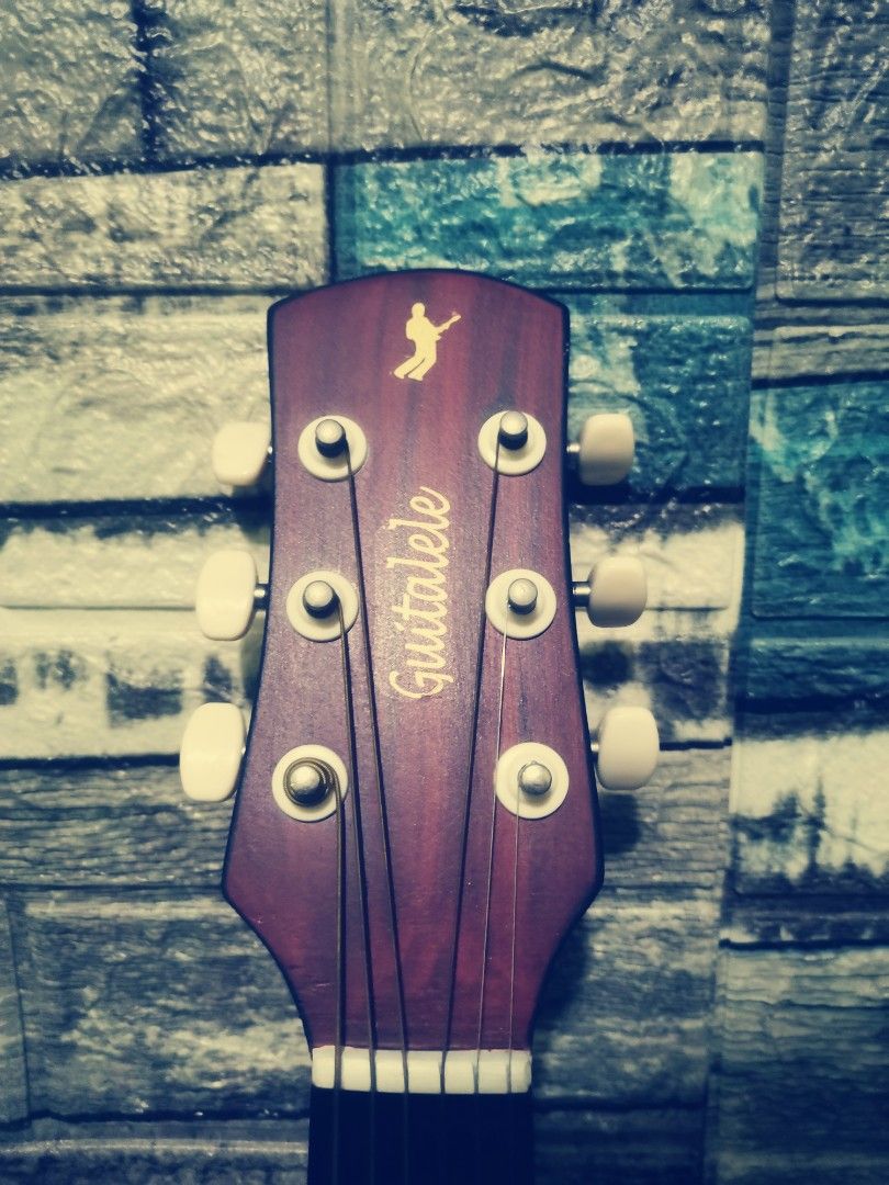 Rj Guitalele (Category: Musical Instruments) located in Caloocan City. Submitted by psychen09 (Listing ID 1375382571, Image 2). Description: Rj Guitalele (guitarlele) 6 strings ₱250 No gig bag, in good condition Perfect pang beginners or pang-kids👌😁 travel - friendly.