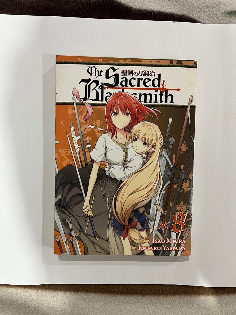 The Sacred Blacksmith Volume 8 (Category: Comics & Manga) located in Rizal. Submitted by redd276 (Listing ID 1375297069, Image 1). Description: Discolored due to age..