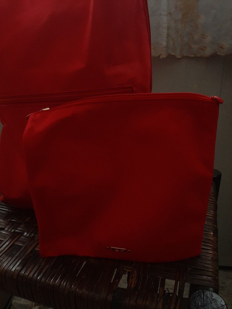 TUMI Packable Backpack (Red) (Category: Luxury Bags & Wallets) located in Quezon City. Submitted by ShoppewithG (Listing ID 1375304691, Image 3). Description: used only once. no flaws color red.