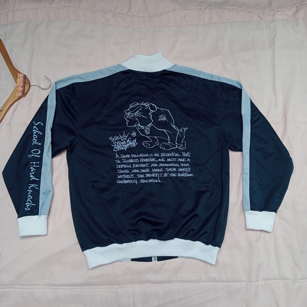 Vintage School of Hard Knocks track jacket (Category: Coats, Jackets and Outerwear) located in Pili. Submitted by purestuffph (Listing ID 1375333714, Image 3). Description: vintage School of Hard Knocks track jacket size: Large width: 22 length: 26.5 embroidered front and back logo's 9+/10 condition 850 + shipping fee or best offer.