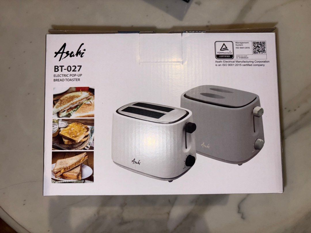 Asahi Toaster BT07 (Category: Ovens & Toasters) located in Quezon City. Submitted by thrifty.peachy (Listing ID 1375605764, Image 1). Description: Asahi BT07 Toaster Brand New, Won in Raffle Product Description: Pop-Up Bread Toaster 2 bread slice capacity 750W 6 toasting settings Stainless steel top plate Cord winder storage Easy open hinged crumb trays With cover Double insulated AC cord Dimensions: 25 x 14.6 x 16.8 cm (L x W x H).
