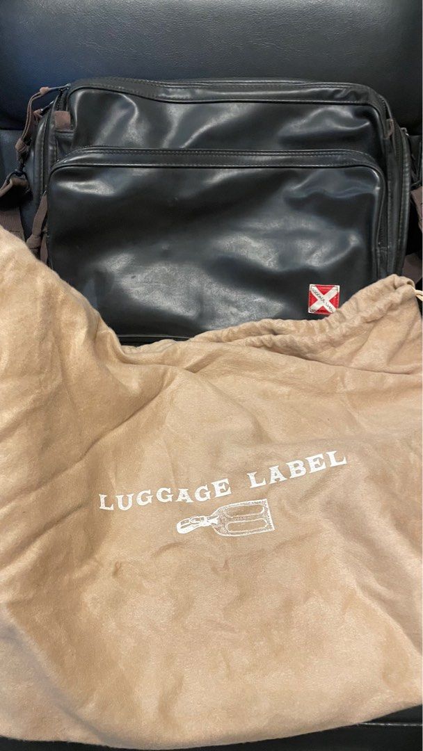 Authentic luggage label sling (Category: Luxury Bags & Wallets) located in Cavite. Submitted by ohmie23 (Listing ID 1375603474, Image 3). Description: Authentic luggage label sling With dust bag.