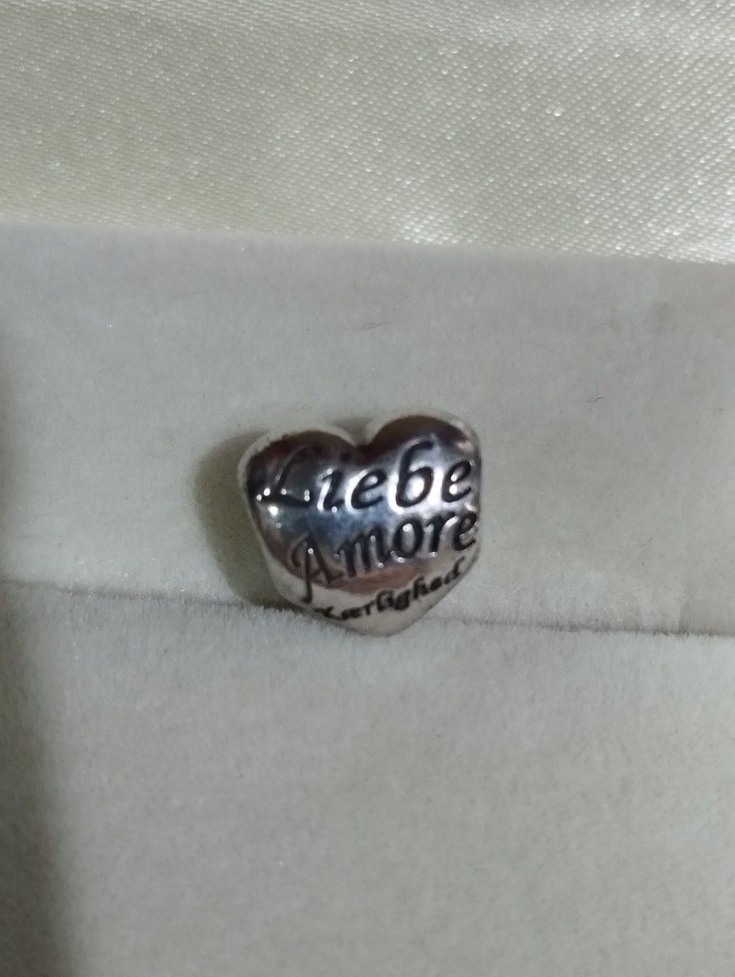 Authentic pand0ra "Language of Love" charm (Category: Charms) located in Manila. Submitted by raine0215 (Listing ID 1375514211, Image 1). Description: barely used pandora heart charm. rfs: i dont have the bracelet anymore.