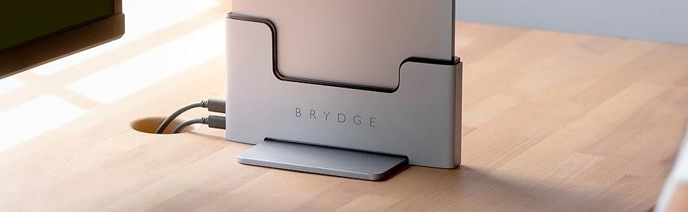 Brydge Space-Saving Laptop Stand | Vertical Docking Station Compatible with 15-inch MacBook Pro (2016-2019), 2 x Thunderbolt™ 3 Ports with 40 Gbps Data throughput (x 2) (Category: Cables & Adaptors) located in Singapore. Submitted by hiddengemm (Listing ID 1375535263, Image 1). Description: QUICKLY CONNECT PERIPHERALS: Form-fitting for a seamless integration and instant connection with all of your devices, including dual external displays. For th