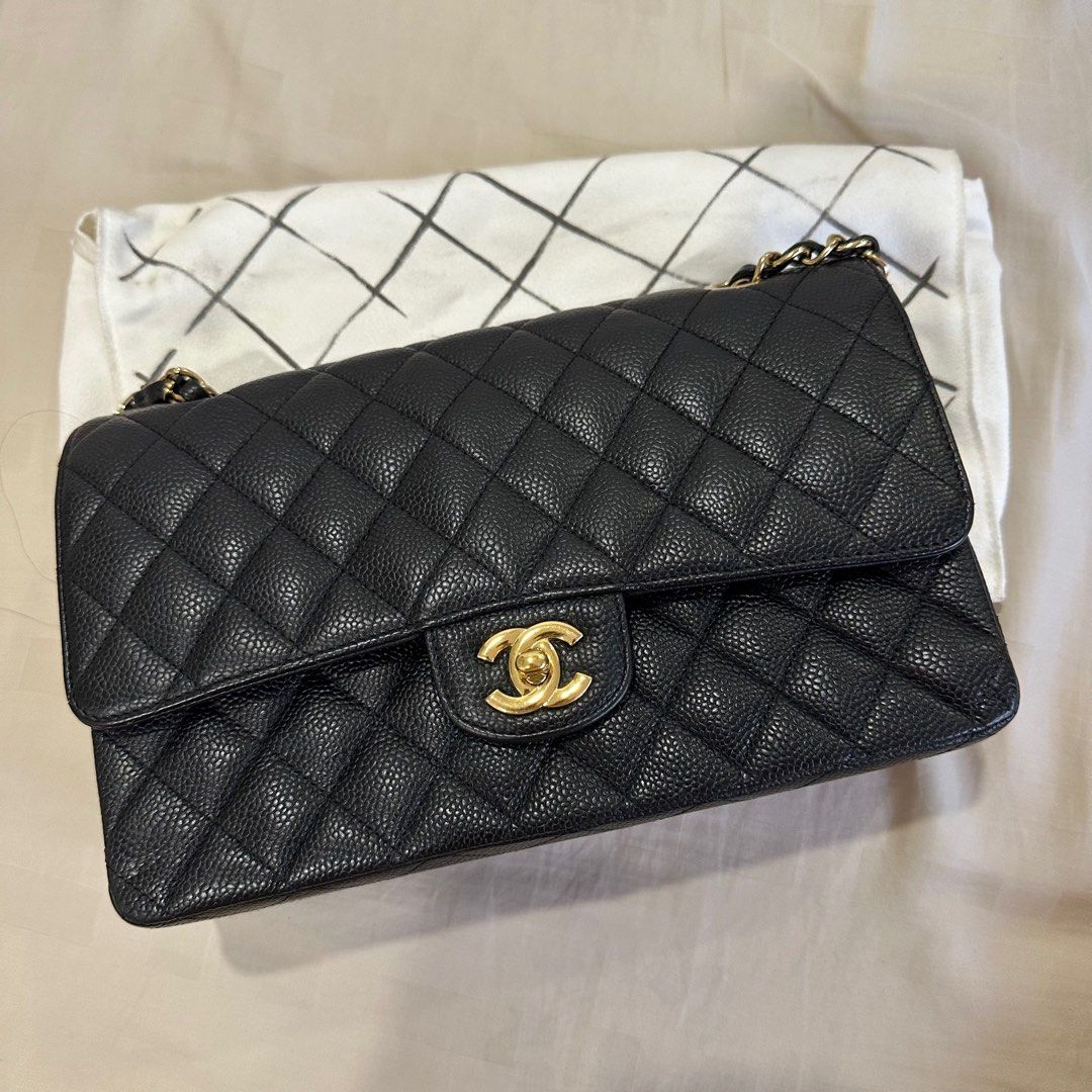 Chanel Classic Medium Flap Series 14 (Category: Bags & Wallets) located in Singapore. Submitted by starrr. (Listing ID 1375570022, Image 1). Description: What’s included: - Bag - Dust Bag - Authenticity Card - Box Slight nego ok! Bought from Luxury Evermore.