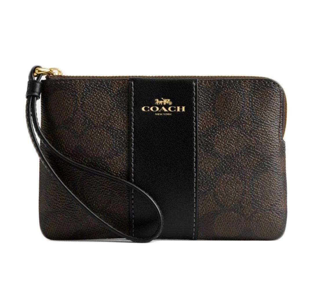 Coach Wristlet Wallet (Category: Luxury Bags & Wallets) located in Lipa City. Submitted by mariegaring (Listing ID 1375564853, Image 1). Description: Color : Wallnut Black 2 cardslots Ziptop closure 15cm L x 10cm H.