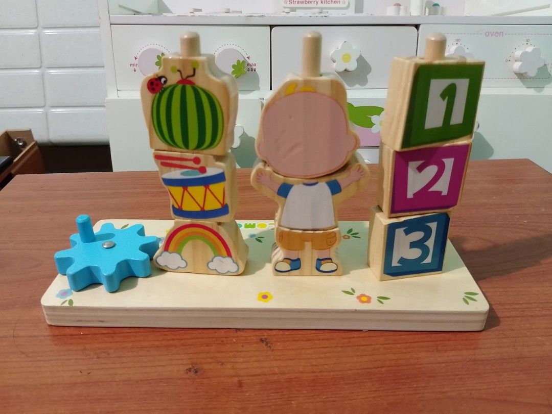 Cocomelon Wooden toy set (Category: Educational & Learning Toys) located in Quezon City. Submitted by bees.kitty (Listing ID 1375612880, Image 2). Description: Cocomelon Wooden toy set P200 - preloved - missing ung 3 na nasa ibaba (pls see last photo, ung nakabilog) - sold as is.