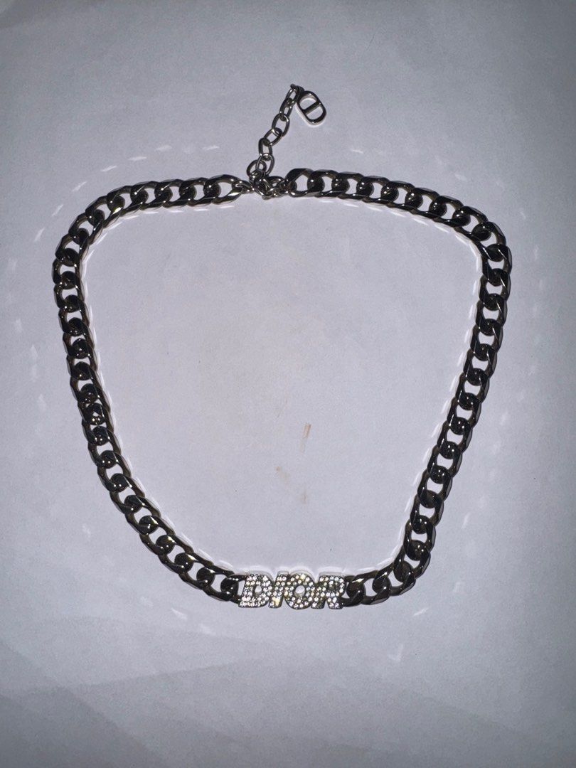 Dior Italic Chain Necklace (Category: Jewelry) located in Singapore. Submitted by esneakers (Listing ID 1375626275, Image 1). Description: Selling discontinued dior italic chain necklace Necklace missing one crystal and 2 crystals became dull, thus selling at discounted price. I can provide all the info needed if you would like to repair at the dior store for a fee. Rtp was 1000+ usd Im open to nego but no lowball please .