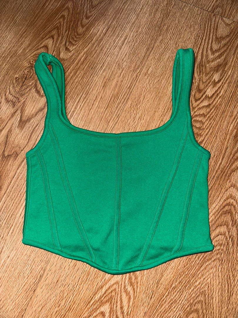 Green Cropped Tank Top (Category: Sleeveless) located in Manila. Submitted by decluttering77 (Listing ID 1375628636, Image 1). Description: - 10/10 condition, used twice - bought from tj maxx - fits xs-s - stretchy material MOP: GCASH *will not ship unless fully paid.