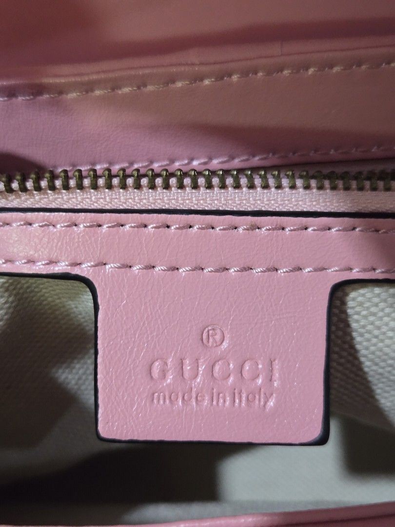 Gucci Marmont bag (Category: Luxury Bags & Wallets) located in Paranaque City. Submitted by dclutterqueen (Listing ID 1371474924, Image 3). Description: Limited Edition Marmont bag Medium size 💯 Genuine Leather (shiny leather) in Red with pink details and chain strap. 🇯🇵 Acquired preloved from Japan 🏍 Metro Manila and nearby areas only, serviceable via Lalamove, Grab Express, and similar couriers.