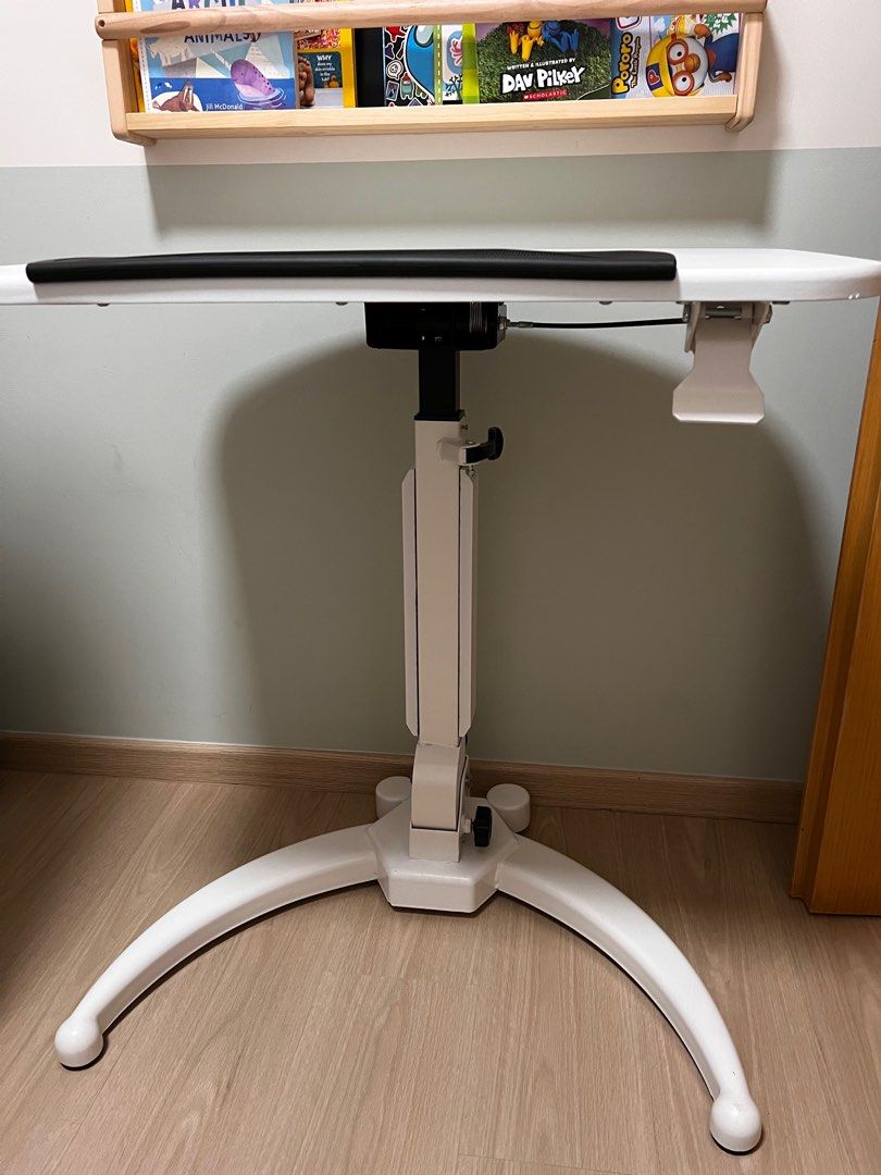 Height Adjustable Table - White (Category: Tables & Sets) located in Singapore. Submitted by miggleness (Listing ID 1375608039, Image 1). Description: Mildly used. Selling because we it’s too high for our young kids. There’s a minor chip. Refer to image. Ergonomic New Height Adjustable Standing Table / Standing Desk Converter / Height Adjustable Table Standing Desk Converter / Sit Stand Dual Monitor and Laptop Riser Workstation / Stand Up Desk Ri