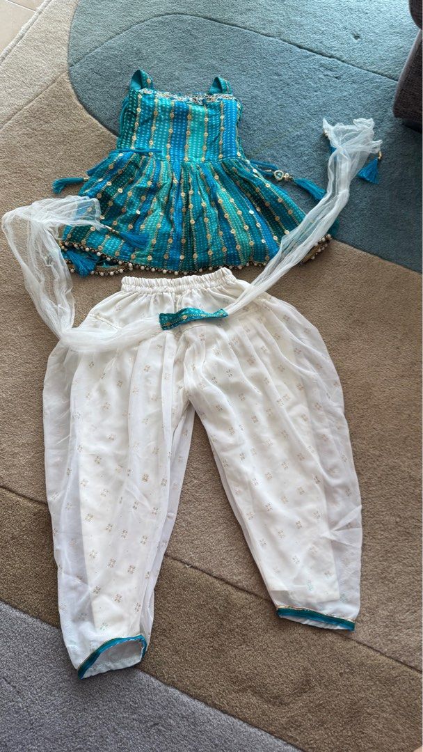 Indian costume (Category: Babies & Kids Fashion) located in Singapore. Submitted by blissfulbe04878 (Listing ID 1375608430, Image 1). Description: Indian Girl Costume Perfect for Deepavali or Racial Harmony Day. Suitable for 3 to 4 year-old. Photo with measurements uploaded for size reference. Self-collection from 820116. Courier delivery available for an additional $2..