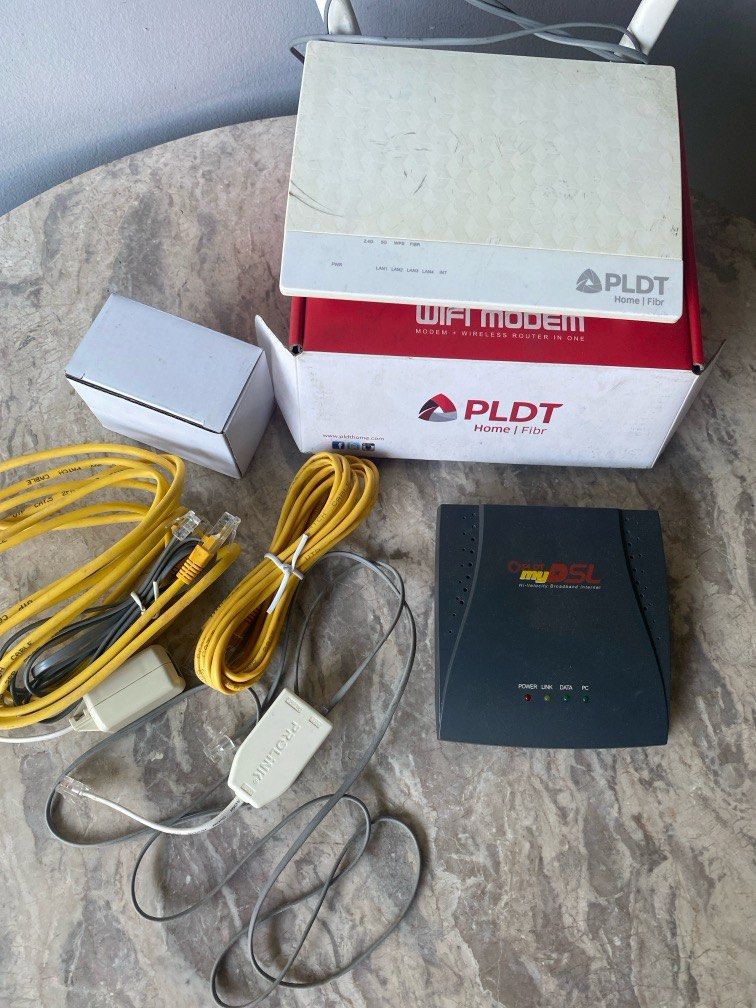 Internet modem and wires old PLDT (Category: Networking) located in Pasig City. Submitted by rafrlwork (Listing ID 1375545442, Image 3). Description: If youre looking for old type modem and accessories. Take all. We are decluttering.