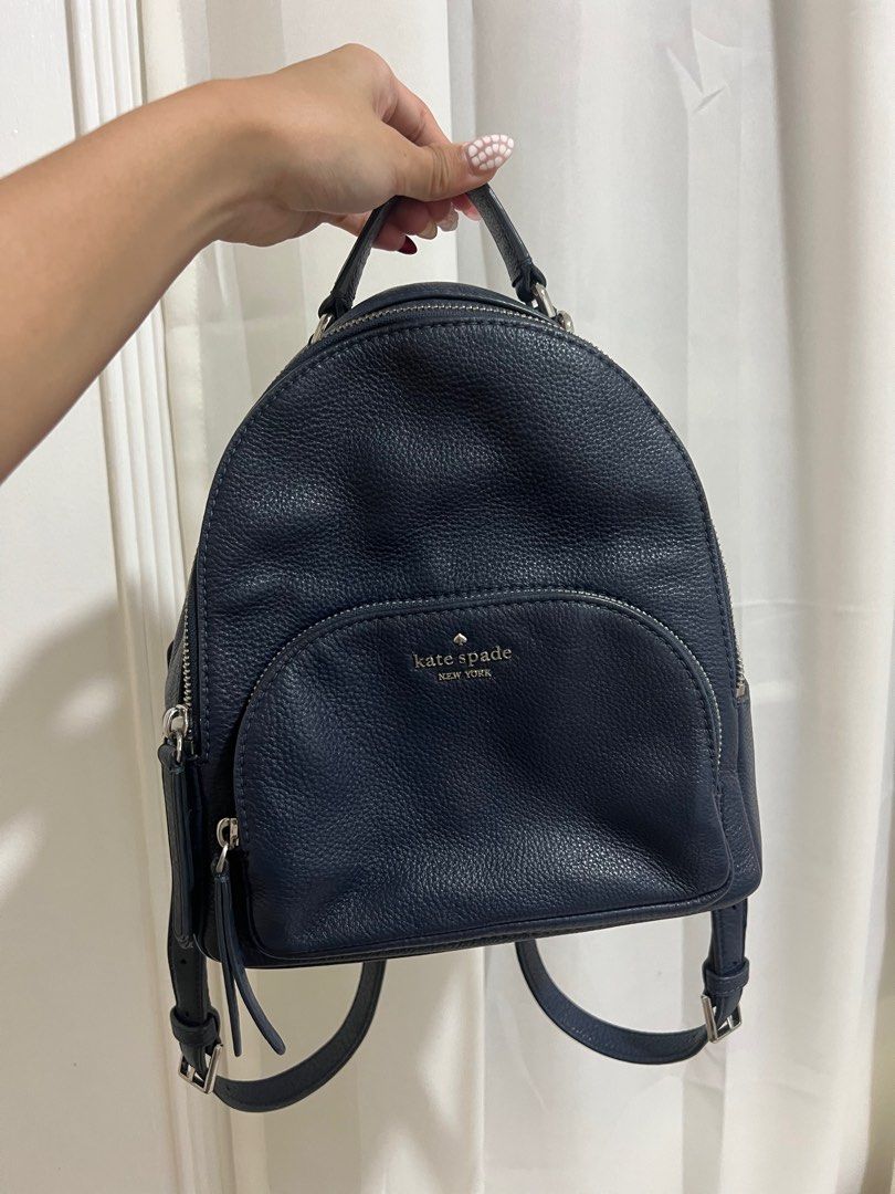 Kate Spade Backpack Bag Navy Blue (Category: Luxury Bags & Wallets) located in Candelaria. Submitted by mnloangel (Listing ID 1375634543, Image 1). Description: Rarely used, leather is a bit deformed due to storage but can be fixed with stuffers. Negotiable. Original retail price is around $300+ .