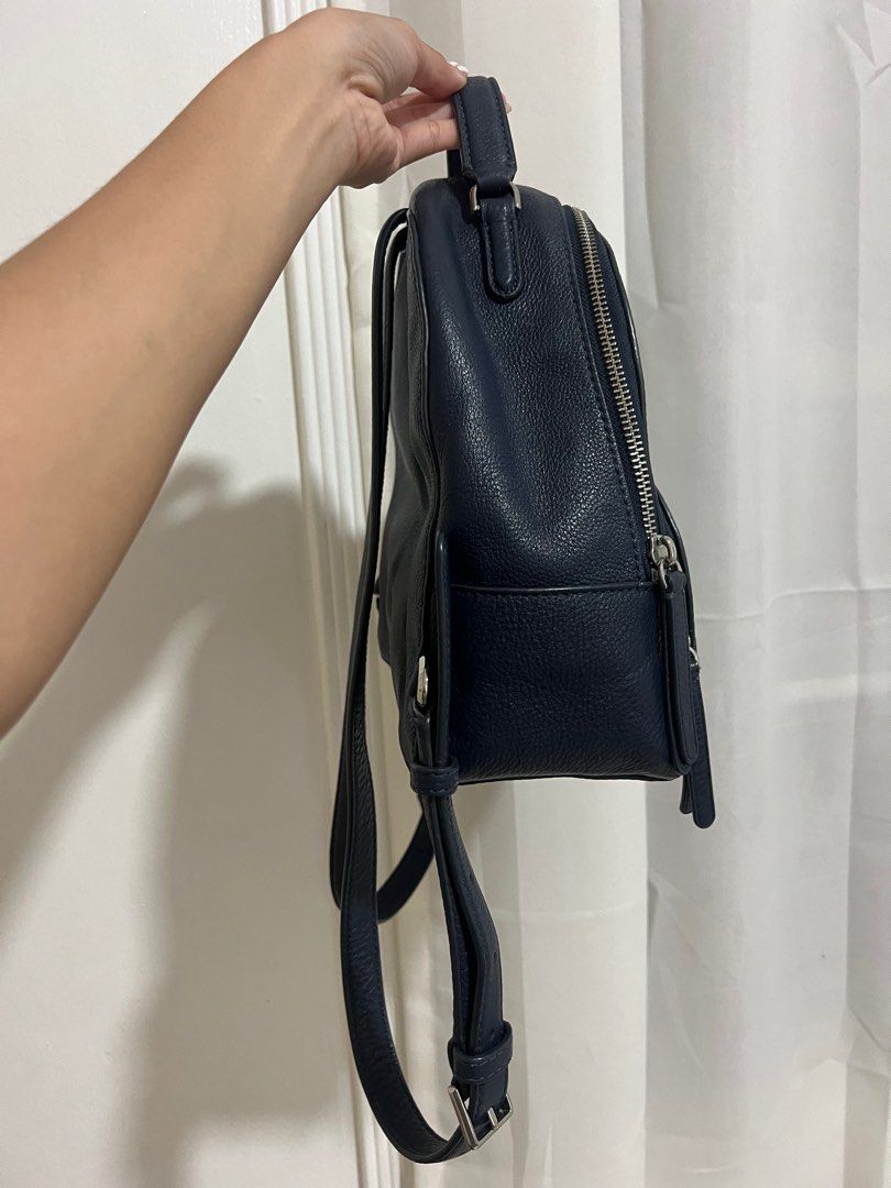 Kate Spade Backpack Bag Navy Blue (Category: Luxury Bags & Wallets) located in Candelaria. Submitted by mnloangel (Listing ID 1375634543, Image 3). Description: Rarely used, leather is a bit deformed due to storage but can be fixed with stuffers. Negotiable. Original retail price is around $300+ .