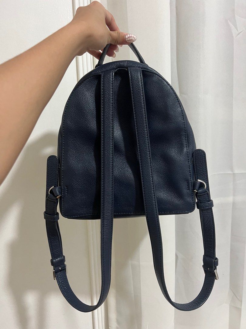 Kate Spade Backpack Bag Navy Blue (Category: Luxury Bags & Wallets) located in Candelaria. Submitted by mnloangel (Listing ID 1375634543, Image 2). Description: Rarely used, leather is a bit deformed due to storage but can be fixed with stuffers. Negotiable. Original retail price is around $300+ .