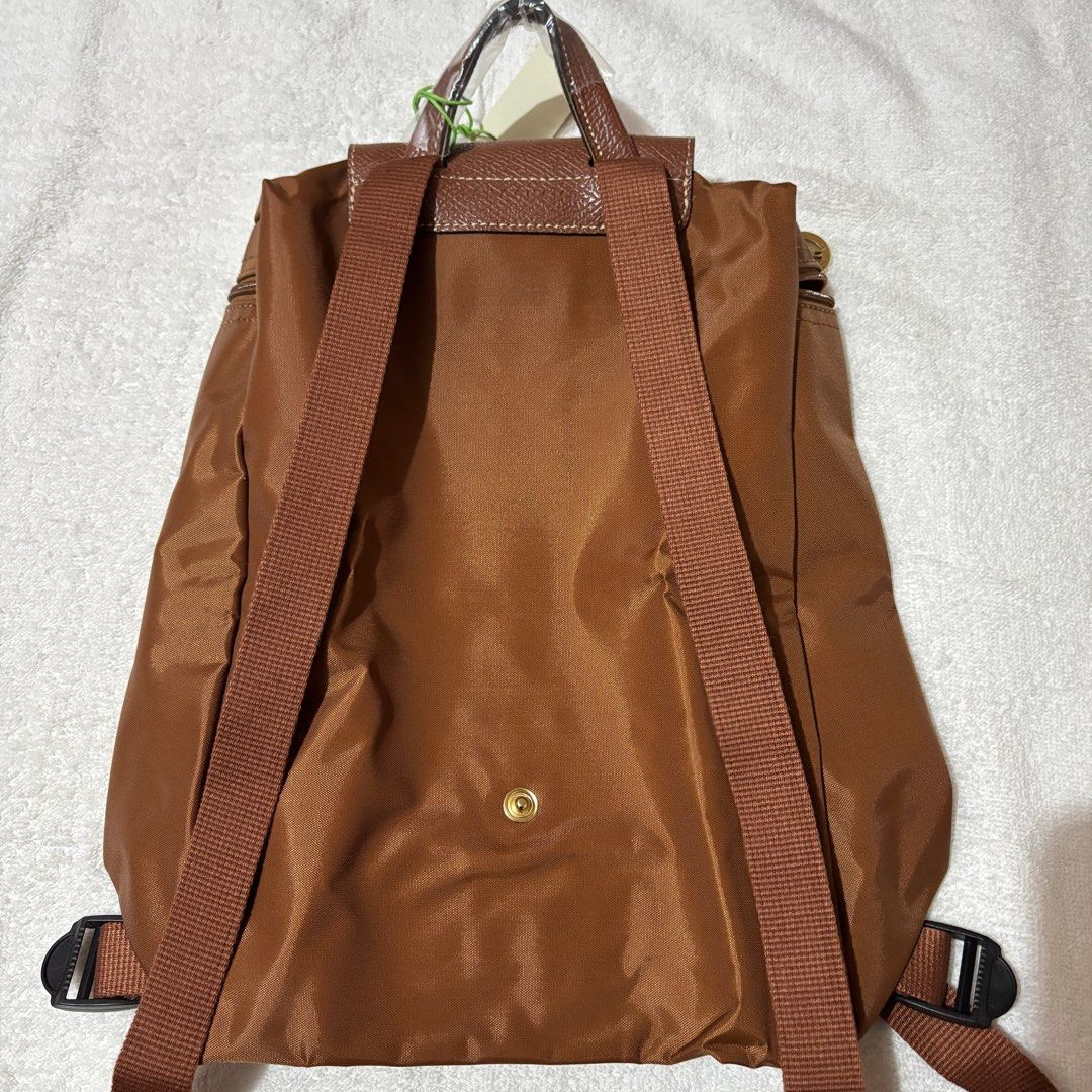 Longchamp Le Pliage Classic Cognac Brown Backpack (Category: Backpacks) located in Quezon City. Submitted by active_assets (Listing ID 1375650972, Image 3). Description: ❗️SEND A MESSAGE ONLY IF YOU’RE A SURE BUYER. Will only reply to serious buyers. Thank you 🙏🏻 ❗️This item is AVAILABLE. ❗️All actual photos posted already. I took the photos myself. ❗️Color may vary due to lighting when photo was taken. Color usually lighter in person ❌No COD ❌