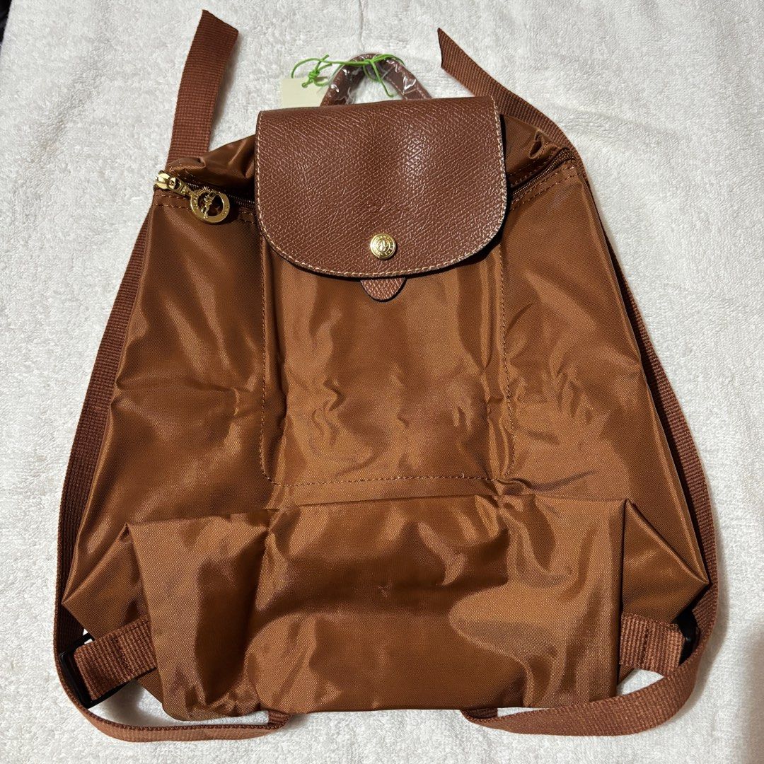 Longchamp Le Pliage Classic Cognac Brown Backpack (Category: Backpacks) located in Quezon City. Submitted by active_assets (Listing ID 1375650972, Image 1). Description: ❗️SEND A MESSAGE ONLY IF YOU’RE A SURE BUYER. Will only reply to serious buyers. Thank you 🙏🏻 ❗️This item is AVAILABLE. ❗️All actual photos posted already. I took the photos myself. ❗️Color may vary due to lighting when photo was taken. Color usually lighter in person ❌No COD ❌