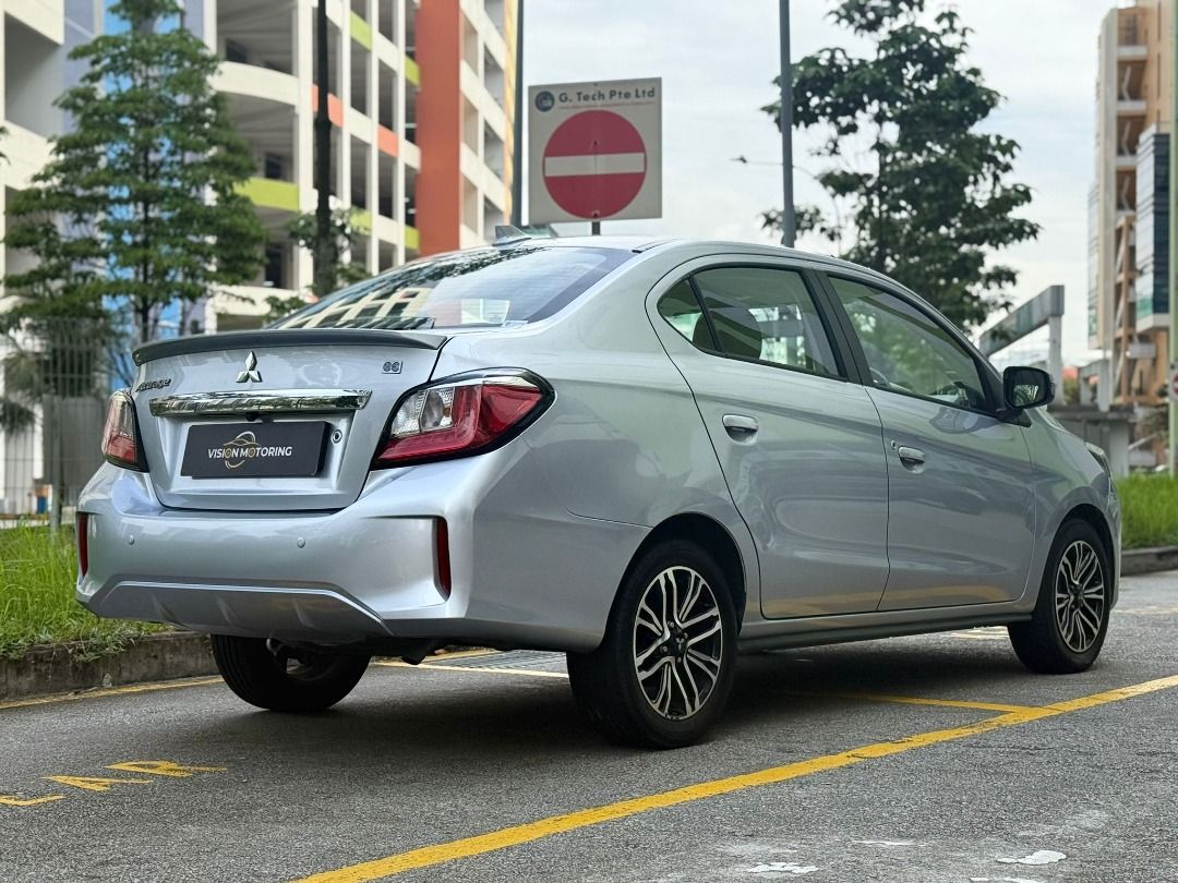 Mitsubishi Attrage 1.2 Auto (Category: Used Cars) located in Singapore. Submitted by alan-visionmotoring (Listing ID 1371229857, Image 3). Description: 🚗 Mitsubishi Attrage 1.2A ✅ 1 Owner Unit 💰 $0 DP Monthly from $11xx Why keep renting when you can own your own car — for both work & personal use Looking for a budget-friendly, fuel-efficient sedan that’s easy to own and maintain? This Attrage ticks all the boxes! ✔️ Fully serviced by C&C. Drive