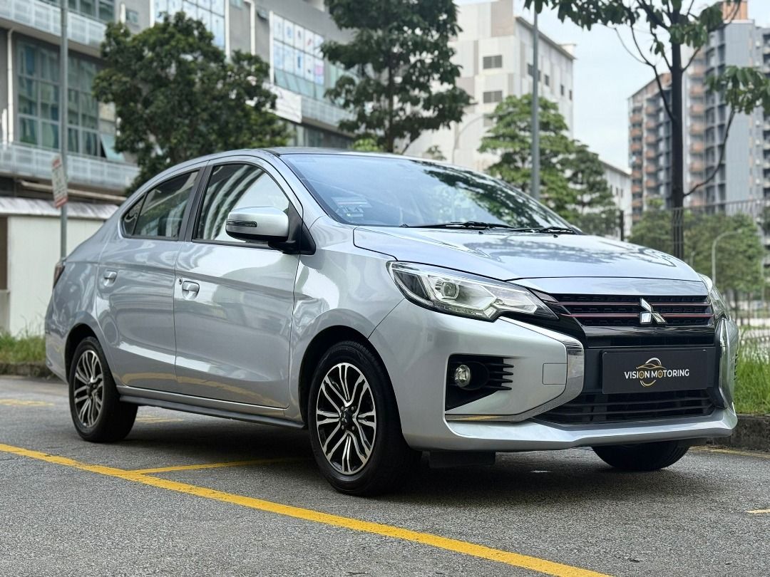 Mitsubishi Attrage 1.2 Auto (Category: Used Cars) located in Singapore. Submitted by alan-visionmotoring (Listing ID 1371229857, Image 2). Description: 🚗 Mitsubishi Attrage 1.2A ✅ 1 Owner Unit 💰 $0 DP Monthly from $11xx Why keep renting when you can own your own car — for both work & personal use Looking for a budget-friendly, fuel-efficient sedan that’s easy to own and maintain? This Attrage ticks all the boxes! ✔️ Fully serviced by C&C. Drive