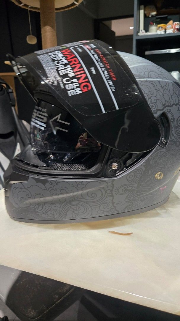 Motorcycle Helmet Cat Design Gray M Size (Category: Motorcycle Apparel) located in Singapore. Submitted by iantanjx (Listing ID 1375599002, Image 2). Description: Brand new helmet, never worn before Tinted visor with retractable sun shade PSB approved Will throw in free gloves, face cover and helmet cover/carrier that came with the helmet Size: M (58-59cm) Reason for selling: Bought too many helmets by accudent.