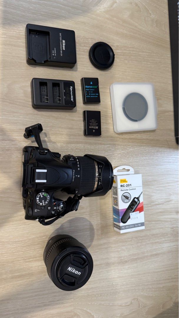 由 yzx7t6dy7626685 (刊登 ID 1375470403，圖片 1) 提交，位於 台北市 (Taipei) 的 二手-Nikon d5100，第一張圖所有配件,價錢可議 (類別：相機)，說明：可單買第二張圖tamron 18-200mm旅遊鏡。