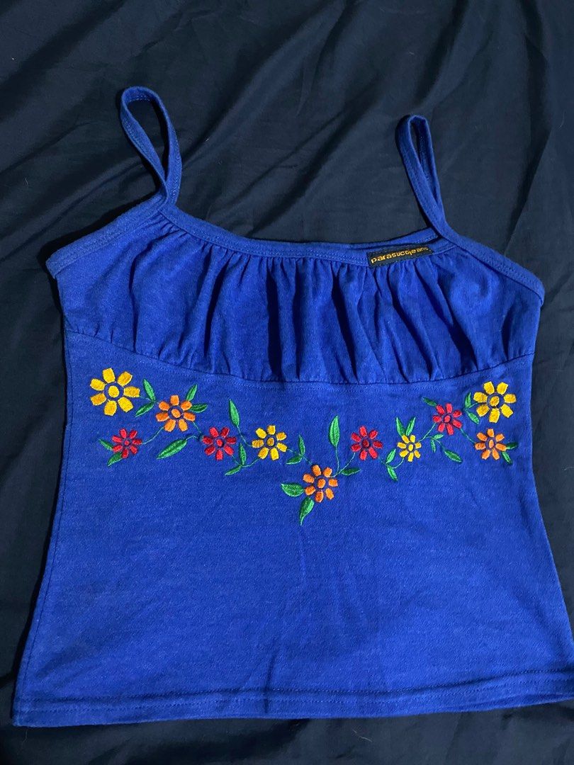 Parasuco Jeans embroidered bustier top (Category: Sleeveless) located in Los Banos. Submitted by dap.daph (Listing ID 1375507058, Image 2). Description: -Ganda in person very eye catching ang color!💙✨ -Accentuates chest area and snatching sa waist🫣 -With white skirt or denim bottoms ughh slayy🥰 -Fits s-semi m .
