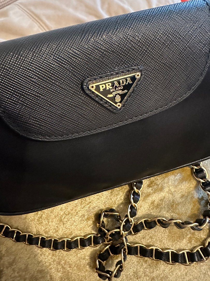 Prada Nylon tessuto chain crossbody (Category: Luxury Bags & Wallets) located in Makati City. Submitted by etherealuxe.ph (Listing ID 1375462363, Image 3). Description: 100% Authentic Prada money back guaranteed if proven fake. Bought in Japan ❤️ Hard to let go but badly needed cash 🙏🏻 Meet up in BGC, Serendra or SM aura only. Please do not make offer if you are not a 100% sure buyer. Let’s not waste each other’s time. No more reciept and cards