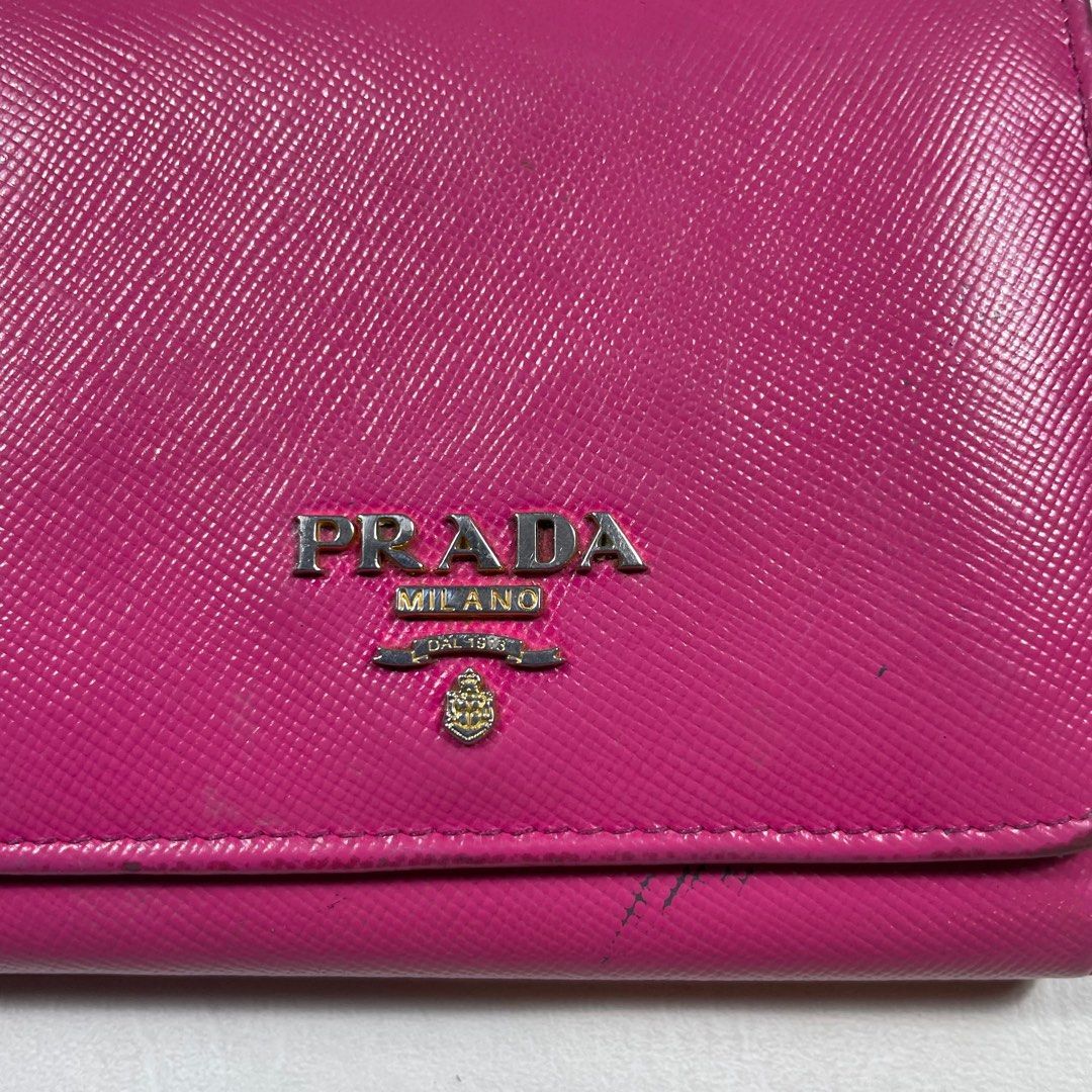 Prada Saffiano Pink Leather Tri-Fold Wallet (Category: Luxury Bags & Wallets) located in Manila. Submitted by revise.ph_ (Listing ID 1375580576, Image 2). Description: Prada Saffiano Pink Leather Tri-Fold Wallet Made in Dimension Length/Height:3.5 Width:4.5 Issue :Check detailed photo Price:3,000 Free shipping Via JNT.