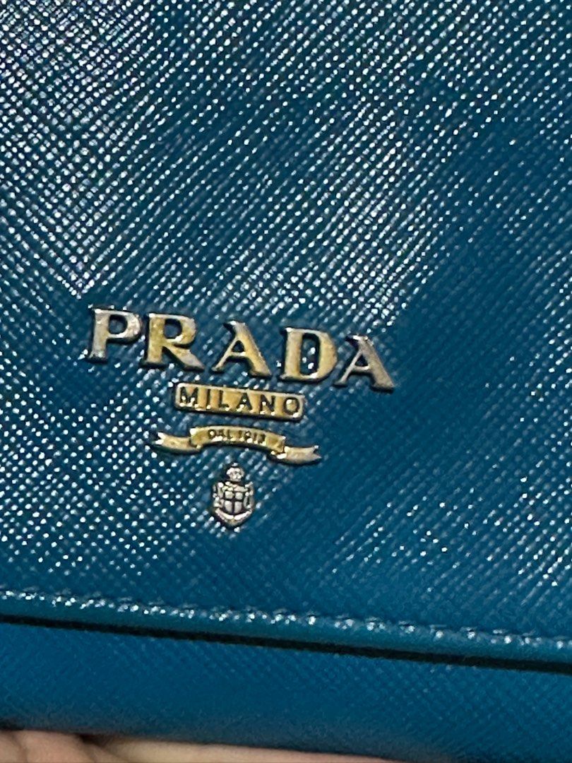 Prada wallet on chain (Category: Luxury Bags & Wallets) located in Makati City. Submitted by markussangabriel (Listing ID 1375625567, Image 2). Description: Good used condition..